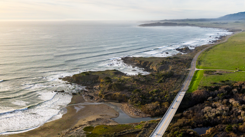 An aerial view of Pico Creek Bridge and San Simeon over Route 1