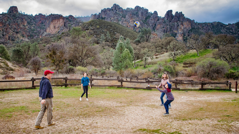 Family playing ball together at Pinnacles National Park