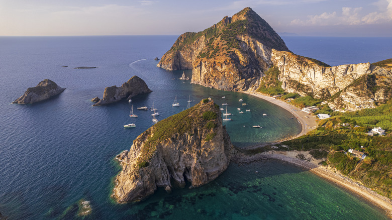 Aerial shot of Palmarola Island along the Italian coast at dusk