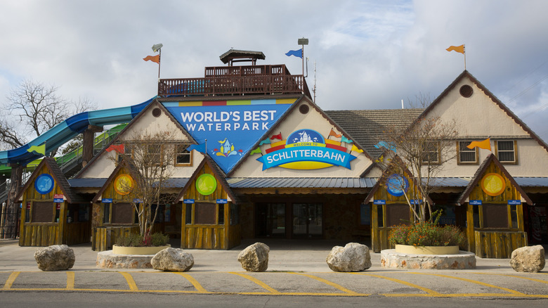 Exterior of Schlitterbahn water park building with outdoor slides visible in background