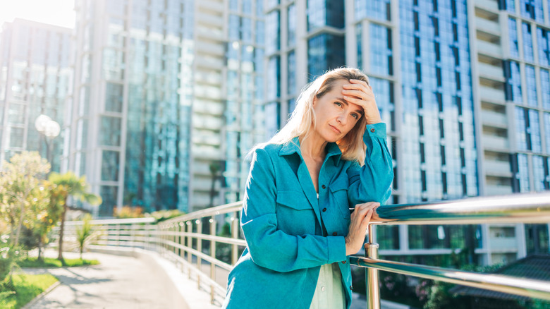 Frustrated traveler standing outside