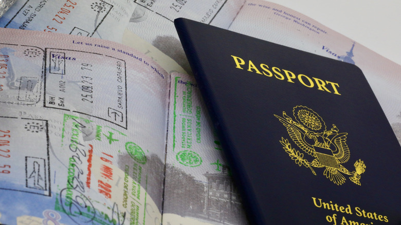 A U.S. Passport and passport stamps in the pages