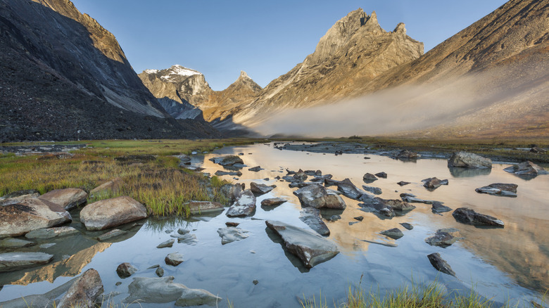 A river reflecting the mountains at Gates of the Arctic National Park