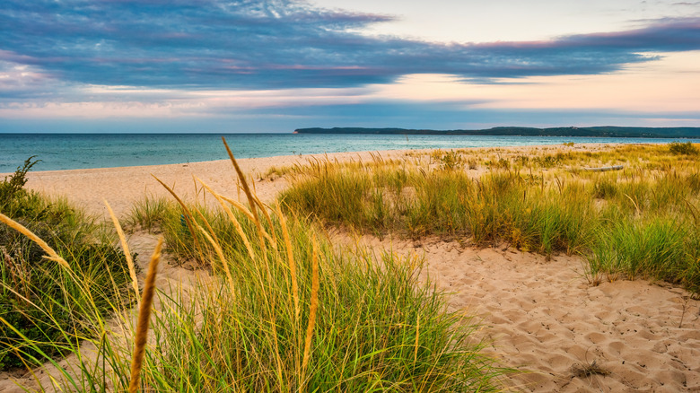 Beach and dune grass at Sleeping Bear Point in Sleeping Bear Dunes National Lakeshore in Michigan at sunset
