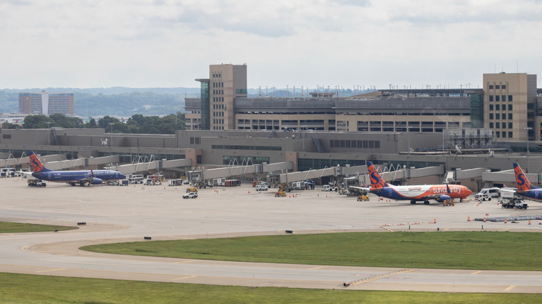 Aerial view of Minneapolis-Saint Paul International Airport with planes parked at the terminal