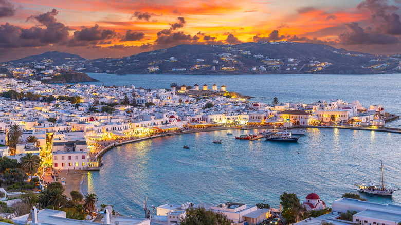 Aerial view of Mykonos, Greece's coastline at sunset