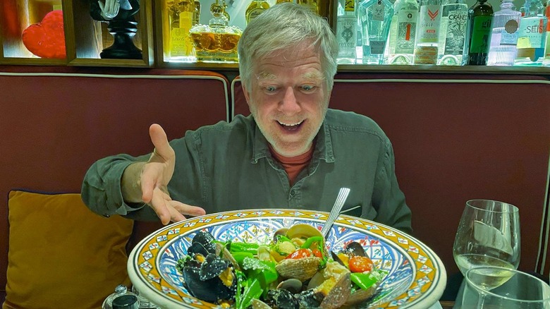 Rick Steves enjoying local seafood in Naples, Italy