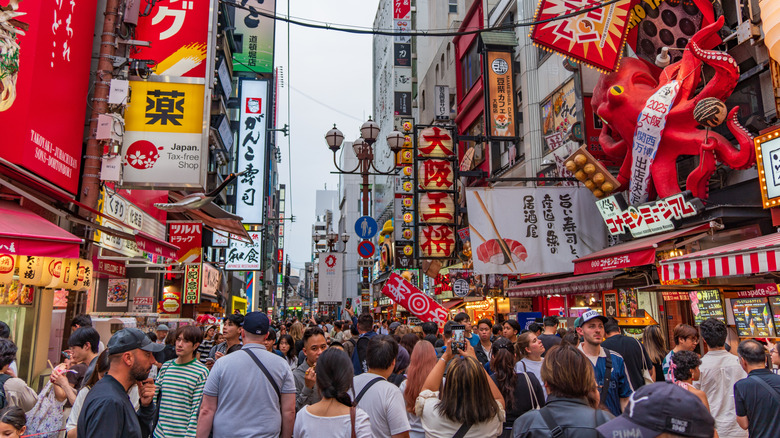 A crowded shopping street in Osaka, Japan