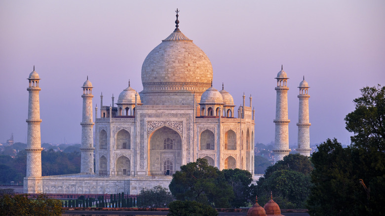 Sunrise light hits the Taj Mahal
