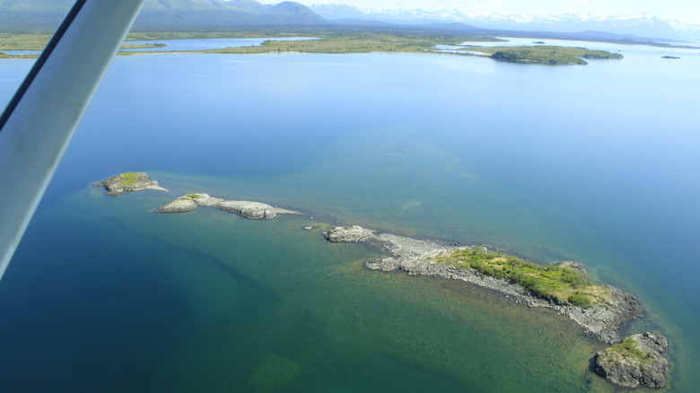 An aerial photo of small islands in Iliamna Lake