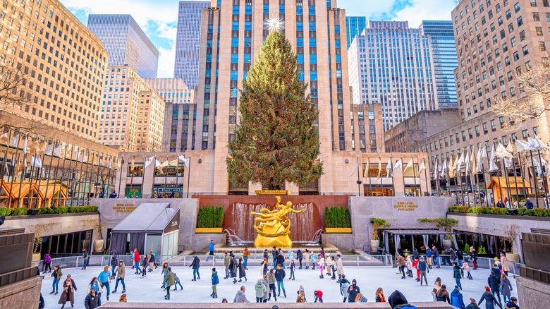 Ice skaters under the Christmas tree at the Rink at Rockefeller Center