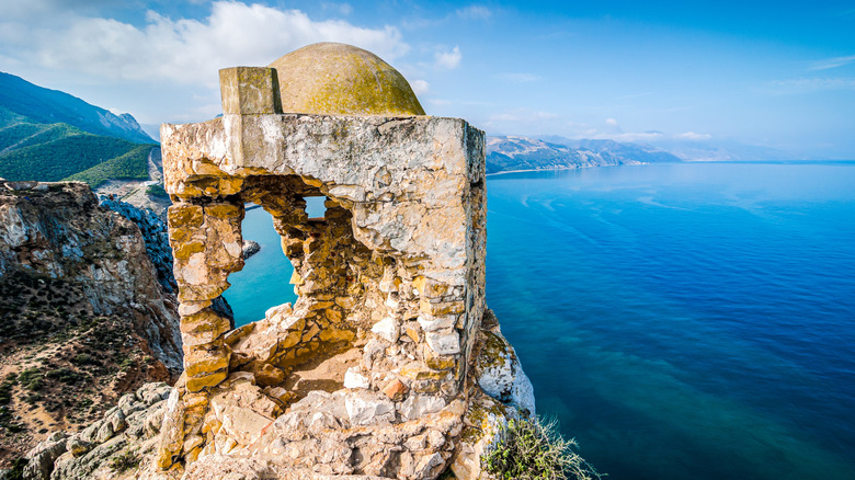 Ruins with window overlooking the dramatic Moroccan coast near El Jebha