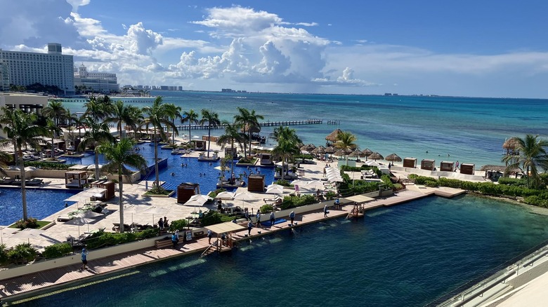 Panoramic view of pool and beachfront at Hyatt Ziva Cancun.