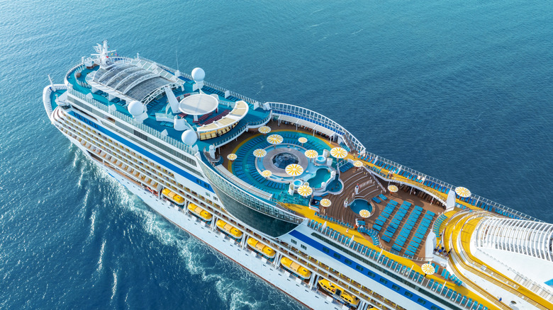 Aerial view of the top deck of a cruise ship, including the pool deck.