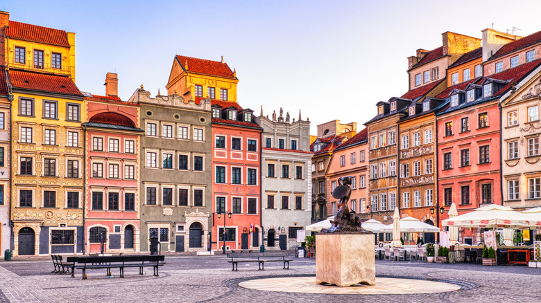 Colorful buildings surrounding a plaza in Old Town in Warsaw, Poland