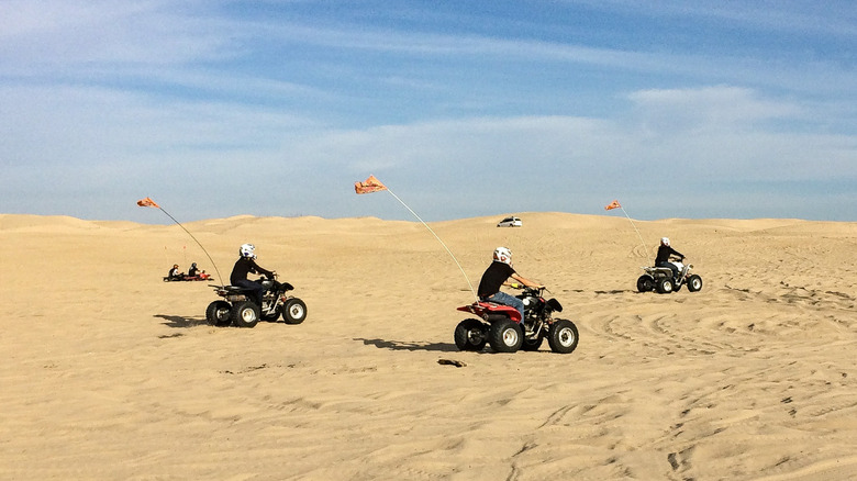 ATVs cruising in the sand at Oceano Dunes State Vehicle Recreation Area