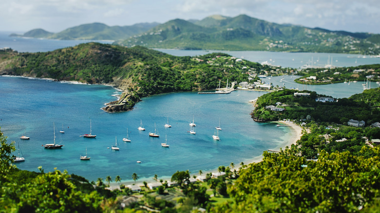 View of Shirley Heights bay with sailboats on a sunny day on the island of Antigua in the Caribbean