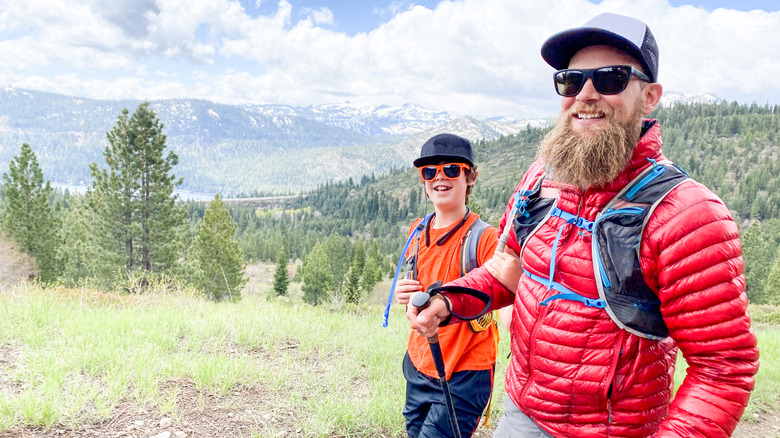 A father and son hike in the hills near Truckee, California