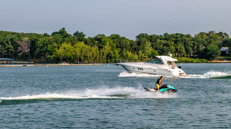 A boat and jetski on Table Rock Lake