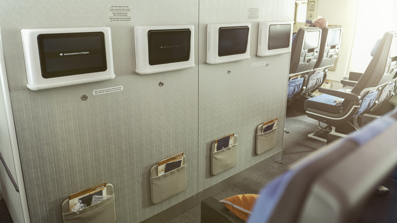 An empty bulkhead row on an aircraft.