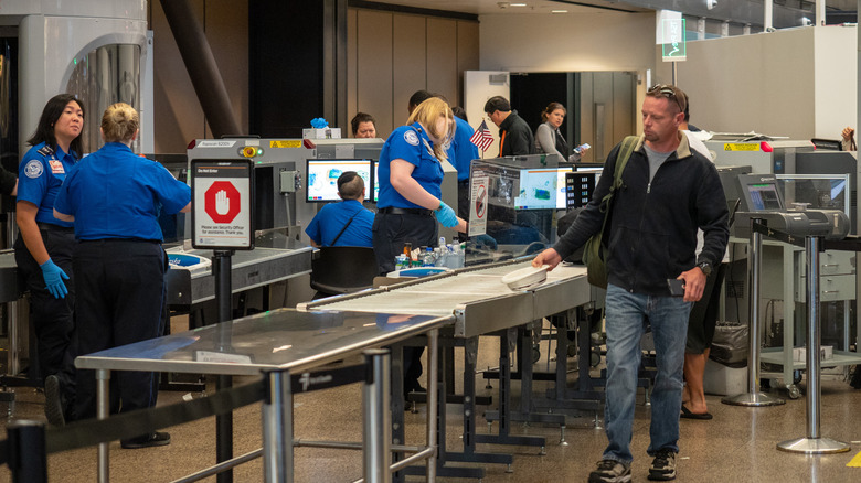 Person going through TSA security