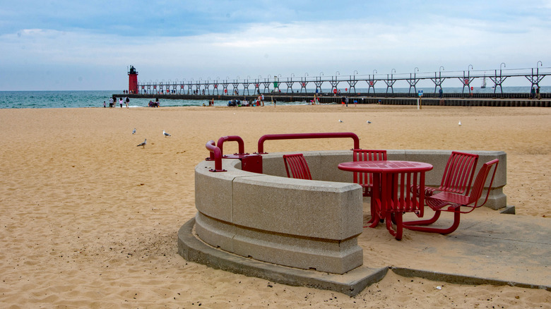 A picnic area and the iconic lighthouse in South Haven, Michigan