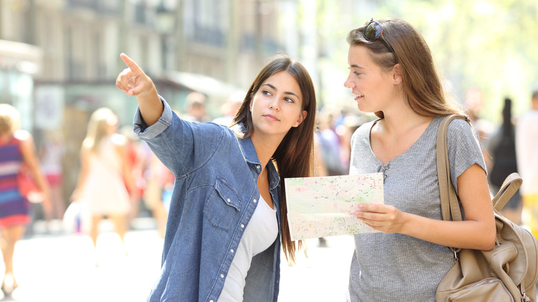 A tourist asking a local for directions