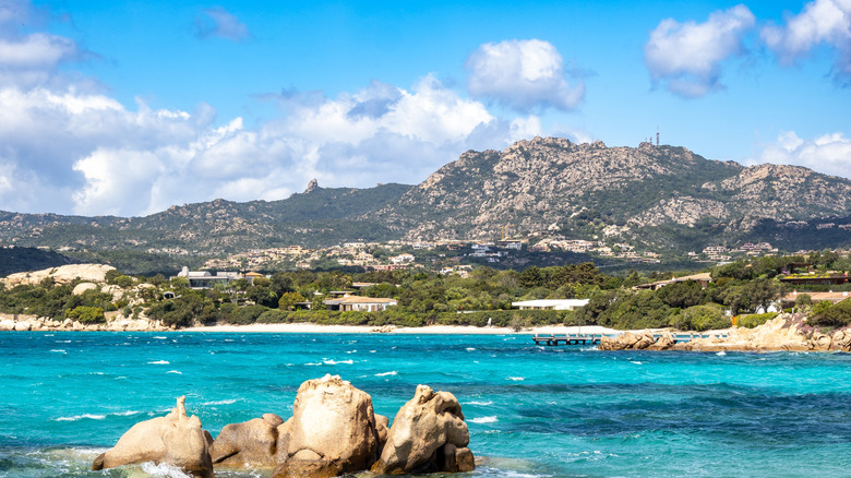 Turquoise water with mountain backdrop