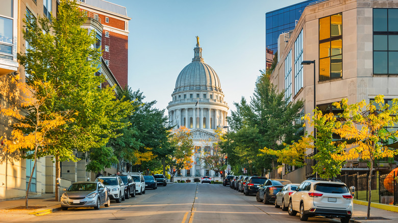 The state capitol rises from the tree-lined streets of Madison, Wisconsin, USA