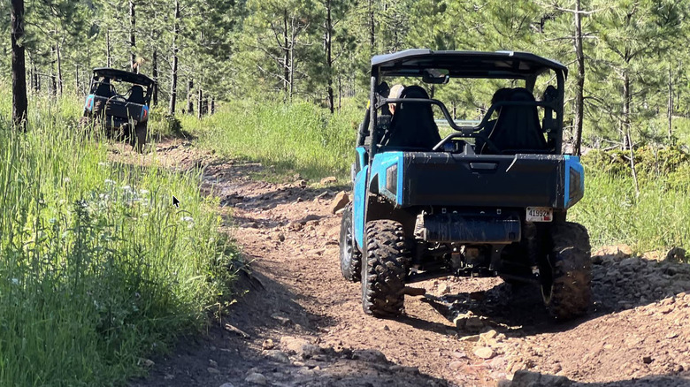 Two UTVs going on an ATV trail through the Black Hills National Forest in South Dakota
