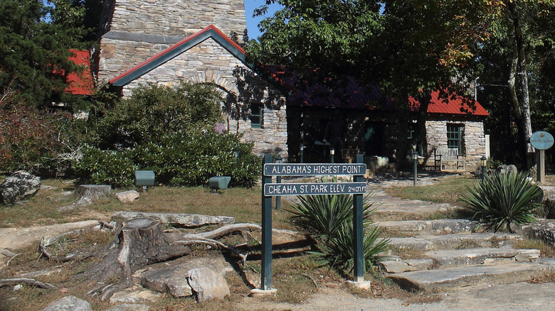 Bunker Tower and a sign for Alabama's highest point, located at Cheaha State Park