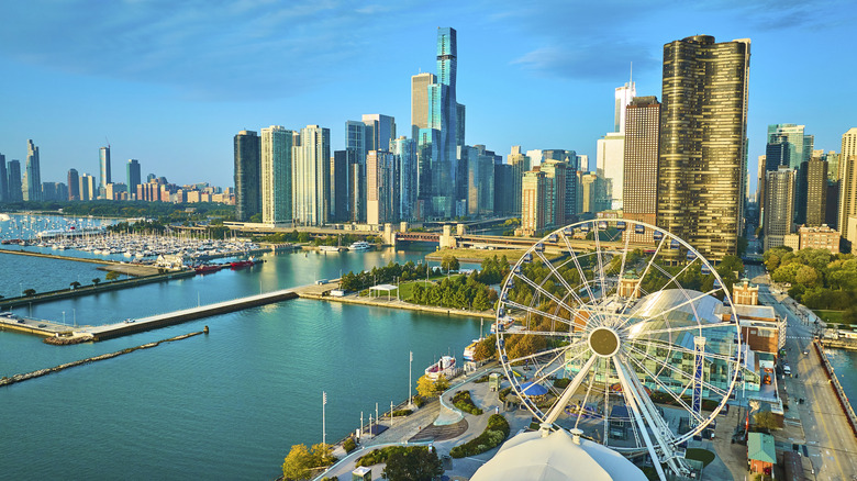Navy Pier Centennial Wheel sunrise with skyscrapers in Chicago, Lake Michigan
