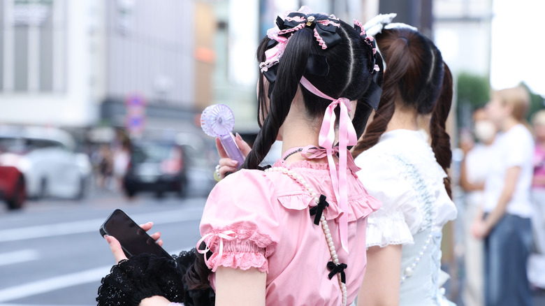 Back view of Harajuku girls dressed in Lolita-style clothing