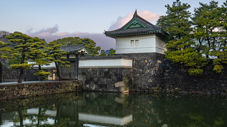 View of the moat and the Imperial Palace of Tokyo during the early morning hours around sunrise