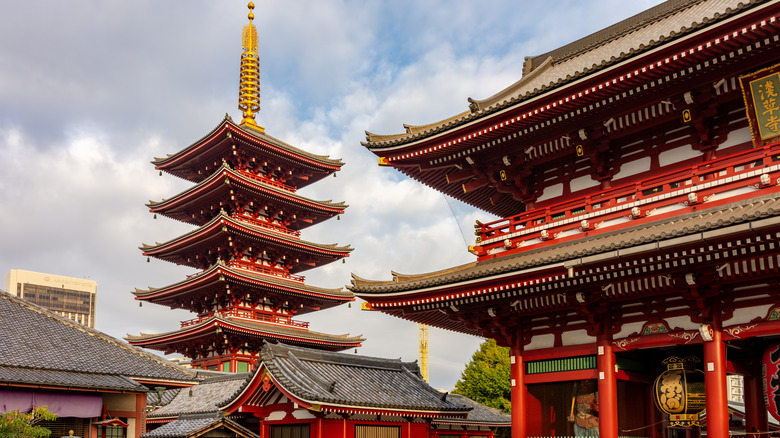 View of bright red and gold Hozomon Gate and Five-storied Pagoda at Senso-ji temple in Asakusa