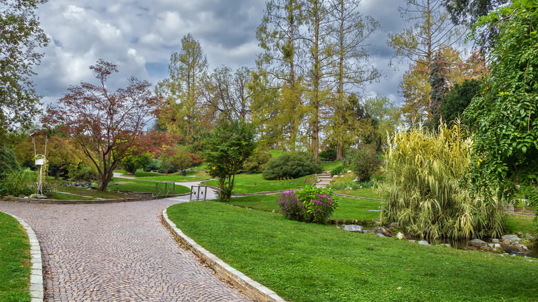 View of a walking path and fall foliage at Valentino Park