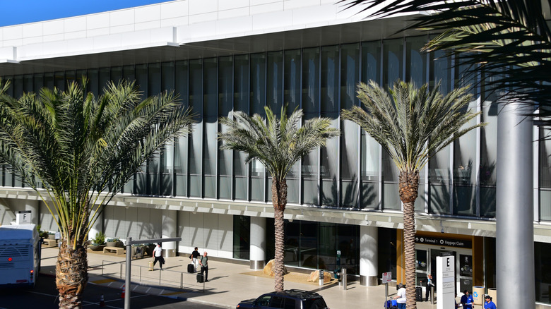 Travelers entering the Terminal 1 building of San Diego International Airport.