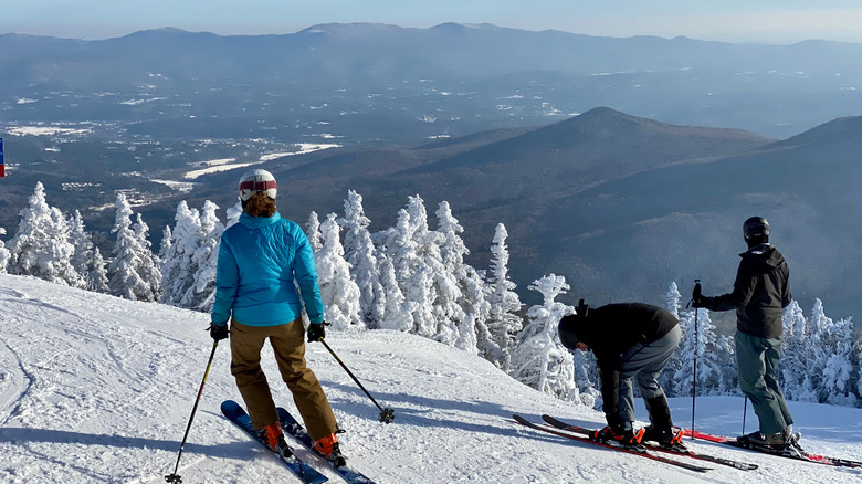Skiers in Stowe, Vermont, on a mountaintop