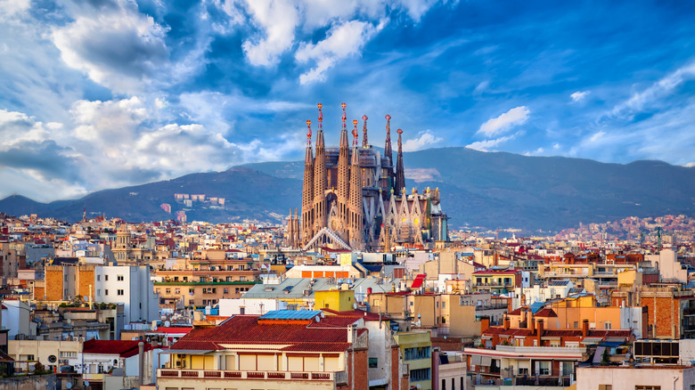 Church of La Sagrada Familia in Barcelona, surrounded by lower buildings