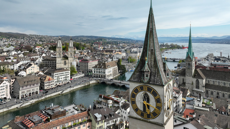Aerial view of Zurich's Old Town skyline focusin on its three main churches, along the Limmat River