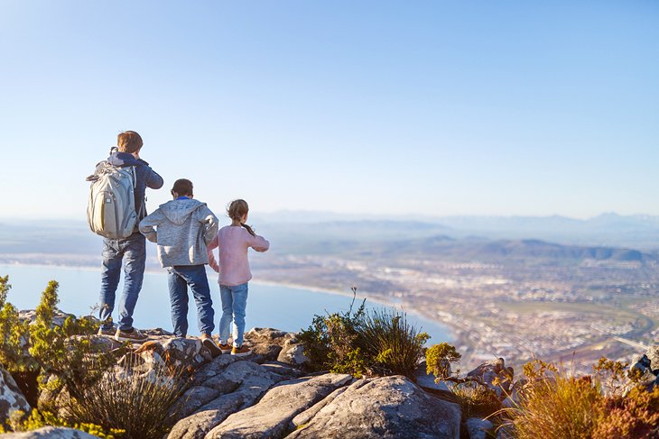 Family enjoying beautiful views from the top of Table Mountain