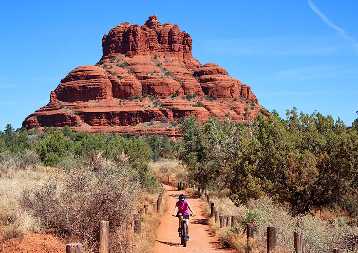 Mountain biker in front of Bell Rock.