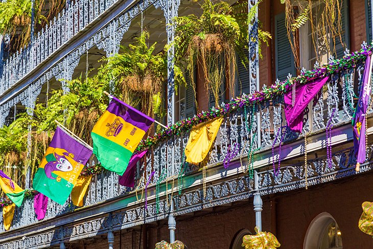 French Quarter ironwork galleries decorated for Mardi Gras in New Orleans