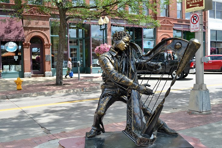 Strings of Happiness sculpture by Osamede Obazee, Sioux Falls SculptureWalk