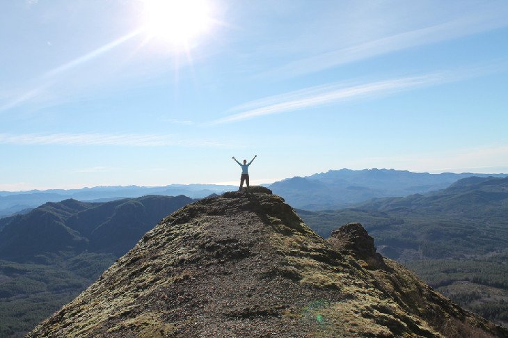 Hiker atop Saddle Mountain