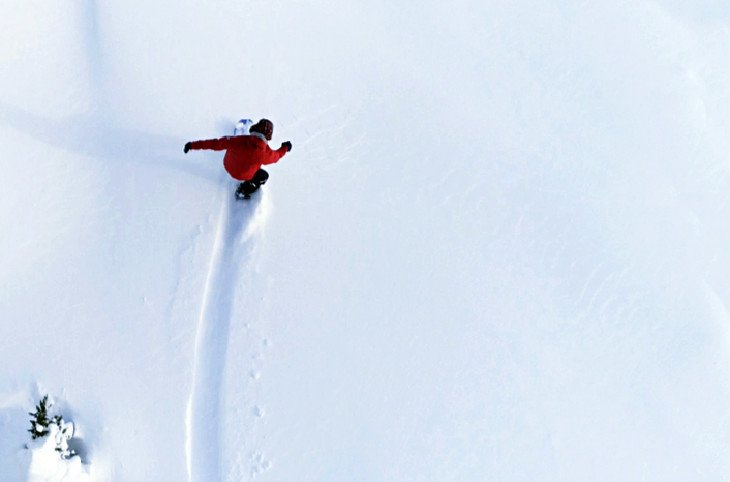 Snowboarder making fresh tracks