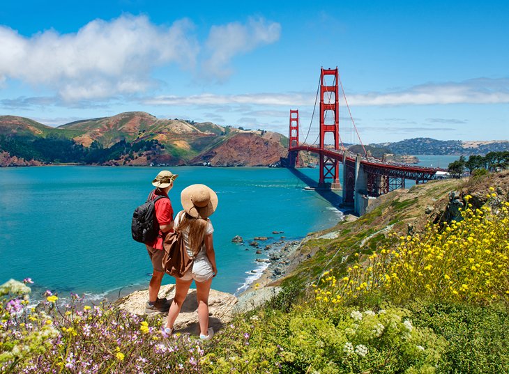 Couple enjoying a beautiful view of the Golden Gate Bridge