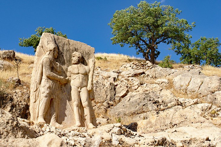 Carving showing Hercules shaking hands with King Antiochus