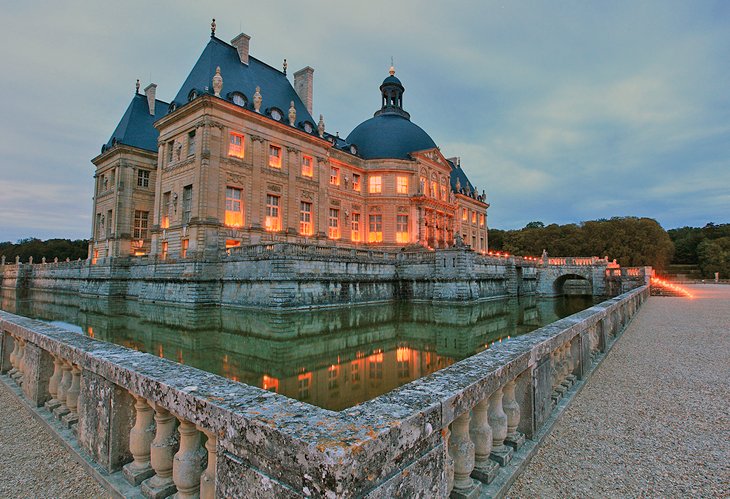 Château Vaux-le-Vicomte grounds illuminated by candles