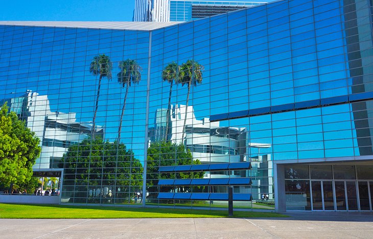 Palm trees reflected in a building in Anaheim